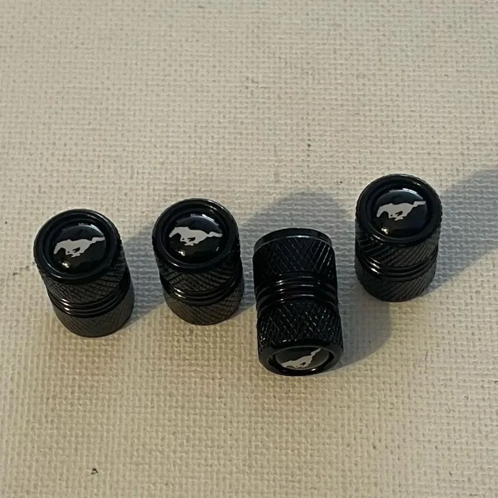 Mustang Logo valve Stem caps in Blackโset of 4โNWT